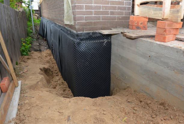 SJ Waterproofing Pros technician performing targeted Sump Pump Installation assessment in New Haven, OH